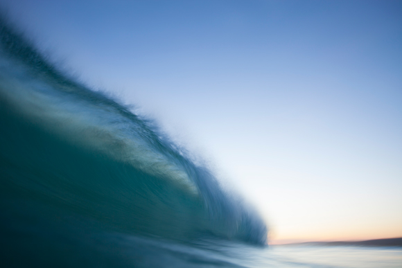 An empty wave breaks at Blackhead Beach