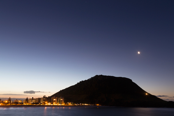 The lights of Mt Maunganui at dusk