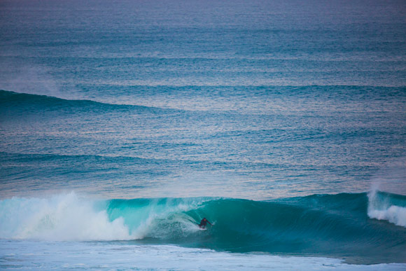 Davy on a board destroying tube ride