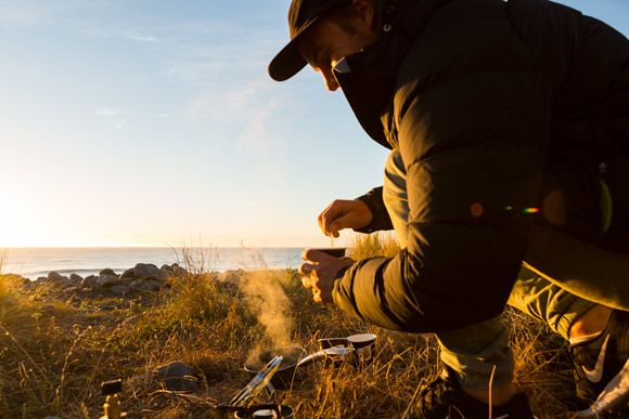 Levi brewing a pre-surf coffee