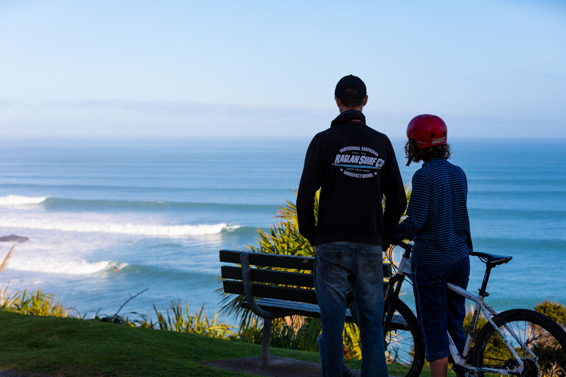 Ken and Nikau Hansen checking the surf