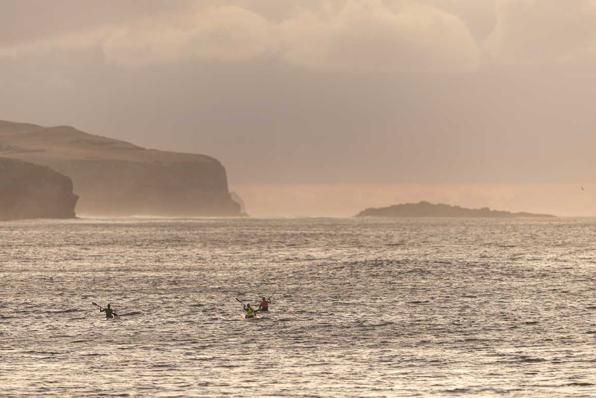 Paddlers at dawn