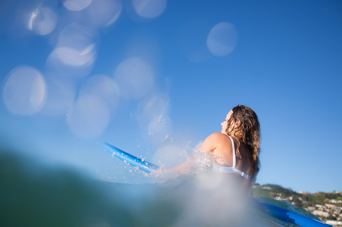 Ruby paddling out during a warm summer morning
